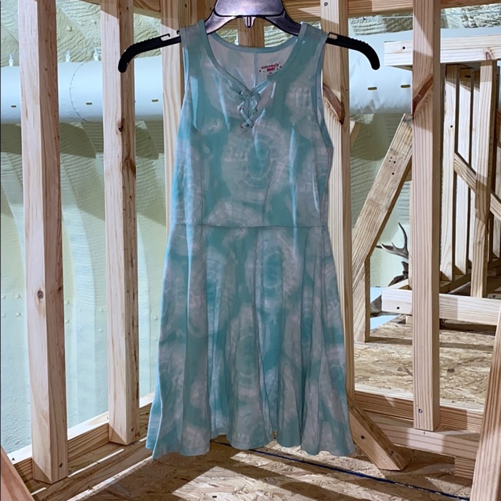 His is a really cool tie-dye dress!
